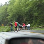 Racers dragging a tree out of Rt 28 on the way to registration.